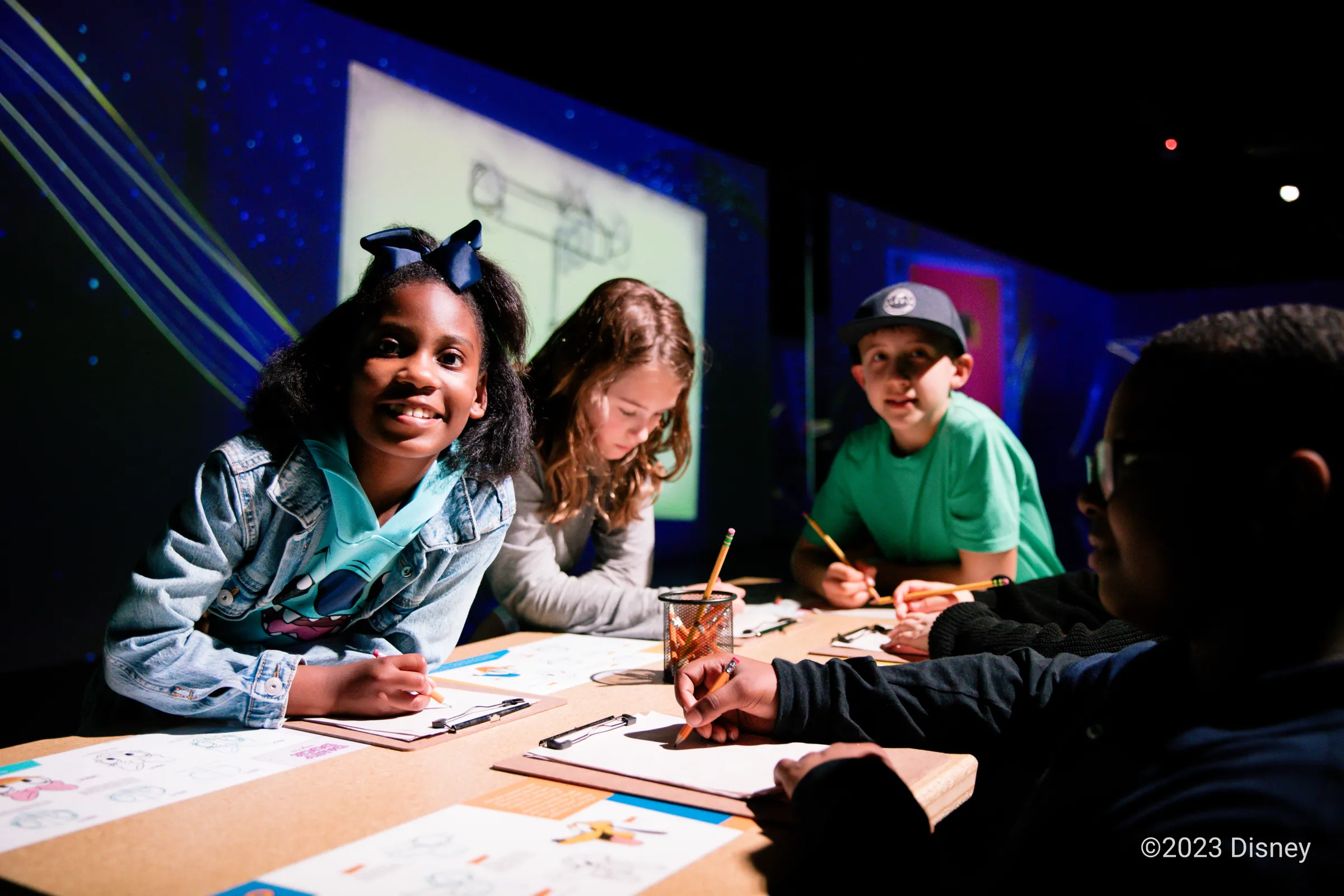 Visitors using the interactive Disney experience.